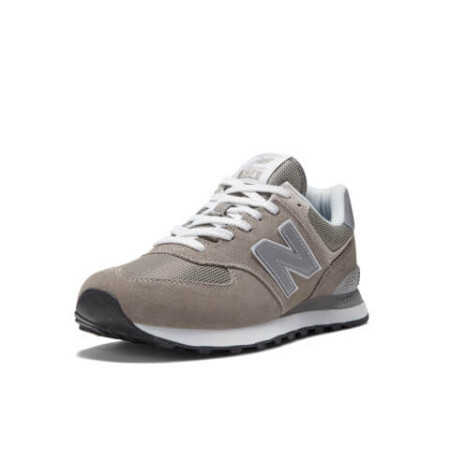 Stylish grey and white New Balance 574 sneakers, perfect for any casual outfit. New Balance ML574EVG