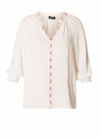 Off white top with coloured embroidery on the neckline.