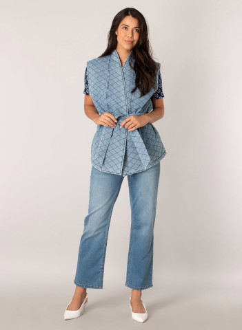 Quilted denim vest on model with jeans