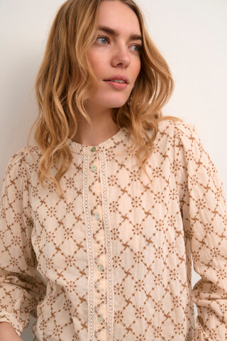Embroidered top on model