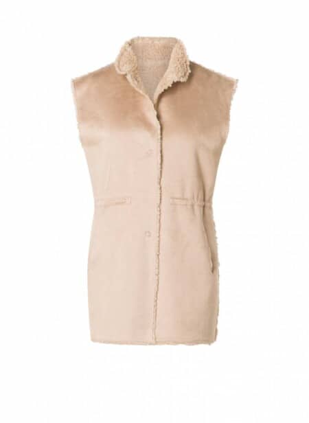 Cream coloured ultrasuede vest with sherpa lining reversible.