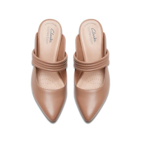 A pair of slip on tan slides with straps over the midfoot.
