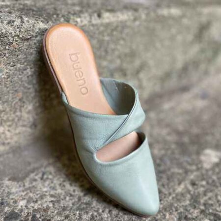 Bueno Blakely Slide in pale green on a concrete step