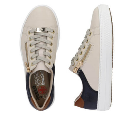 Stylish white leather sneakers with zipper detail, perfect for casual outings. Rieker Gurgaon walker.