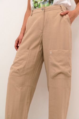 Cream Nosanna cropped pant in tan with front ankle zip details and patch pockets.