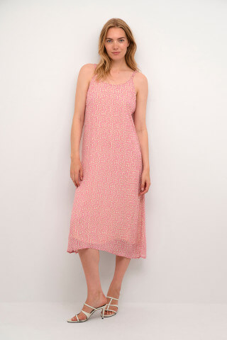 Model wearing the Cream Linea dress in Pink Geometric print