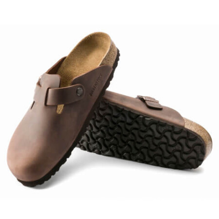 Brown leather Birkenstock Boston Clogs, perfect for a casual yet trendy outfit.