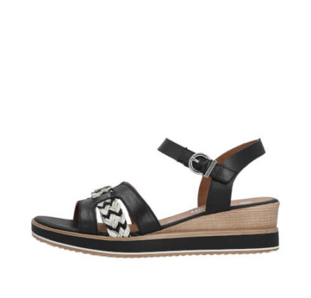 Trendy black and white wedge sandal featuring a chic zigzag design. Remonte Trenzado sandal.