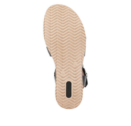 Trendy black and white wedge sandal featuring a chic zigzag design. Remonte Trenzado sandal.