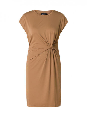 Model wearing Yest Zulifya dress in light brown.