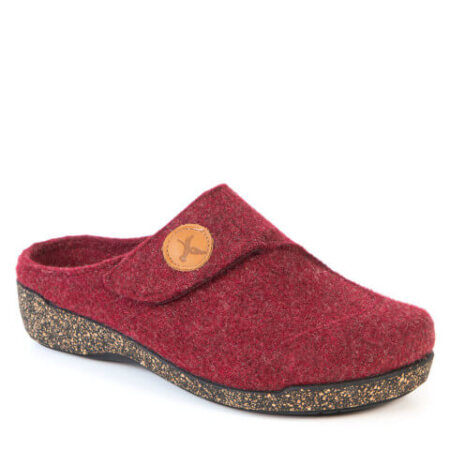 The Portofino Melina Slipper is a beautifully crafted, boiled wool slipper designed for ultimate comfort and support, especially for those dealing with foot issues. Made in Spain, the Melina slipper features a felt lining and a micro-cork outsole, providing a perfect blend of warmth, flexibility, and cushioning. Key Features: Boiled Wool Upper: Offers softness, breathability, and warmth, ideal for cozy indoor wear. Felt Lining: Ensures comfort and keeps your feet snug without overheating. Micro-Cork Outsole: Adds lightness and natural support, making each step feel cushioned and supported. Foot-Friendly Design: Tailored for individuals with specific foot concerns like bunions, flat feet, plantar fasciitis, and more, the slipper provides relief and added comfort for sensitive feet. Width H: A generous fit that accommodates wider feet or foot problems such as Morton's neuroma and rheumatoid arthritis. Special Notes: The Melina slipper is thoughtfully designed to cater to a variety of foot ailments, offering a supportive and soothing experience for people with bunions, claw-toes, or high-arched feet. With its cozy yet supportive construction, the Portofino Melina Slipper is the perfect choice for anyone seeking both comfort and functionality for their feet at home.