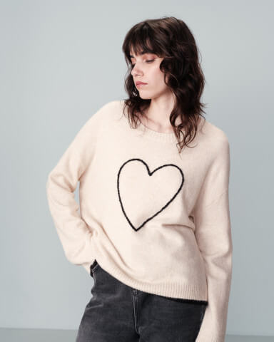 Grace and Mila Namaste pullover with large heart design on the chest.