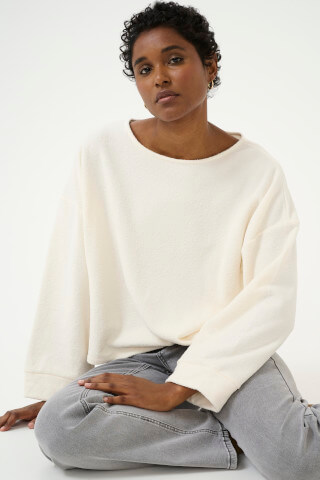 Model wearing Cream CRFranny Sweater in Eggnog