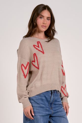 A model wearing the Elan Heart sweater